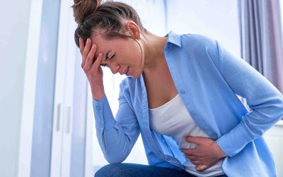 Sickness woman suffering from pms and menstruation pain. Having stomach ache, abdominal pain and headache because of critical days. Inflammation and infection bladder, cystitis. Health problems
